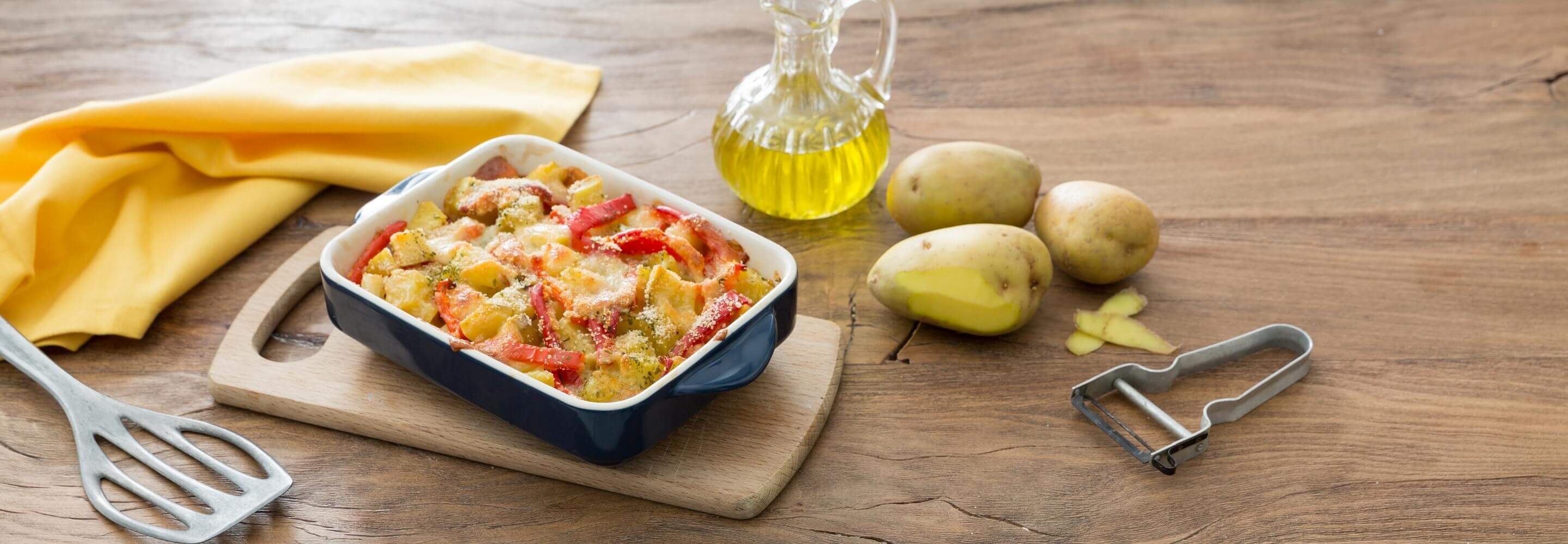 Peperoni e patate al forno con mozzarella